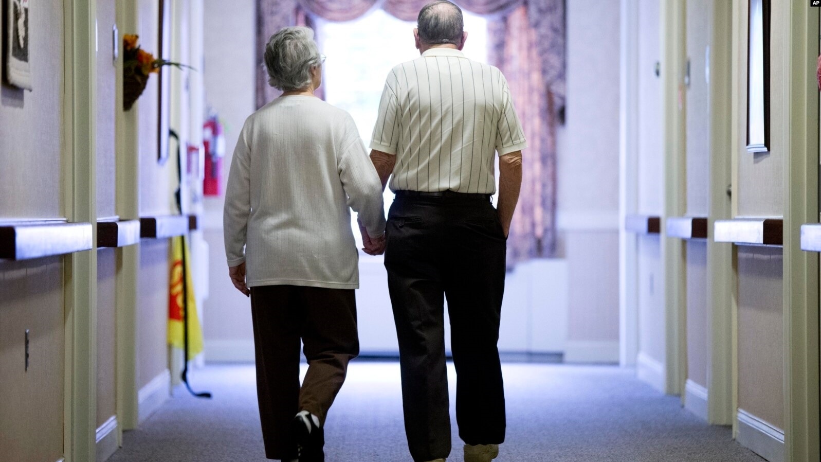 two old persons walking